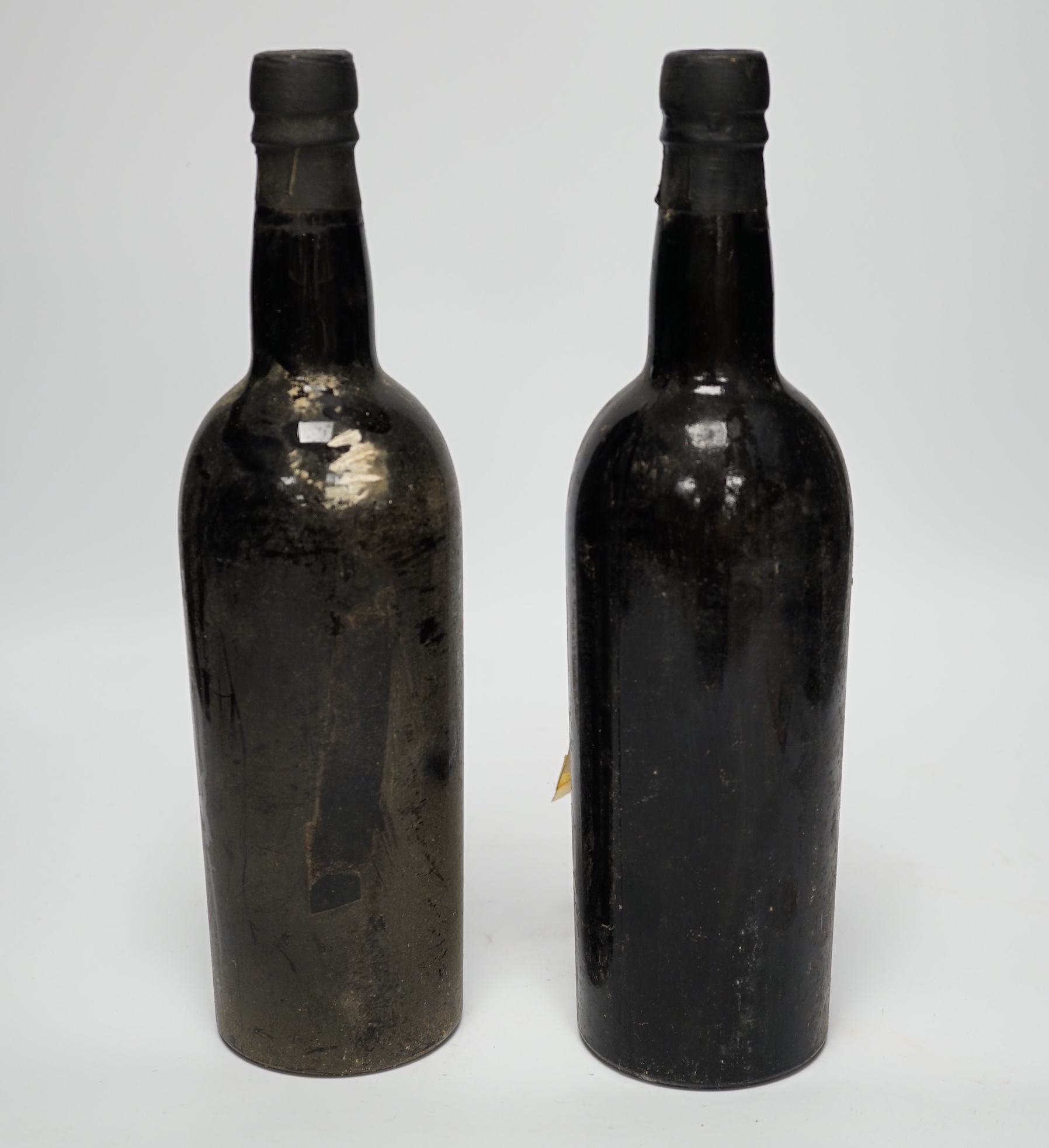 Two bottles of Sandeman Port Vintage 1960